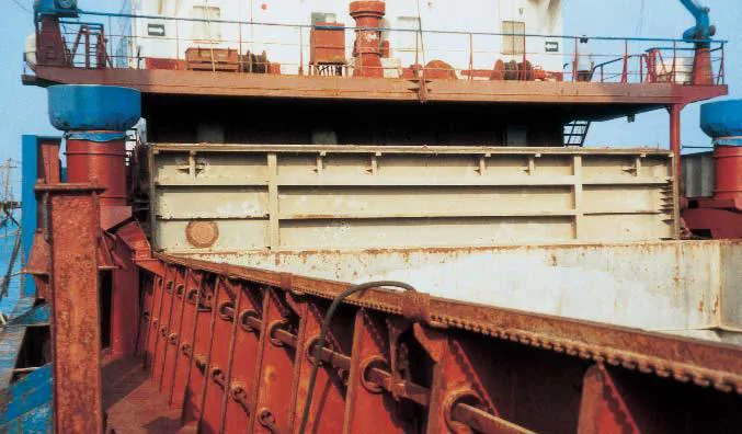 Hatch cover panels stowed clear of the cargo hold opening