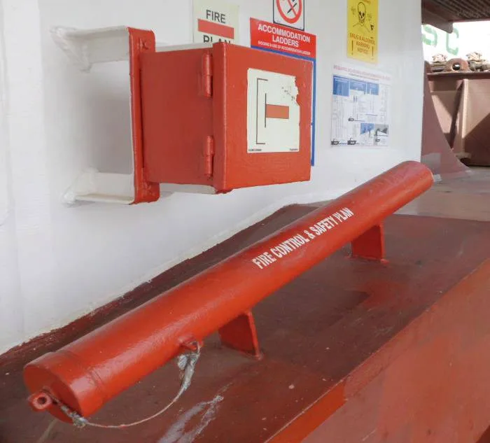 Red weatherproof fire plan container at the gangway