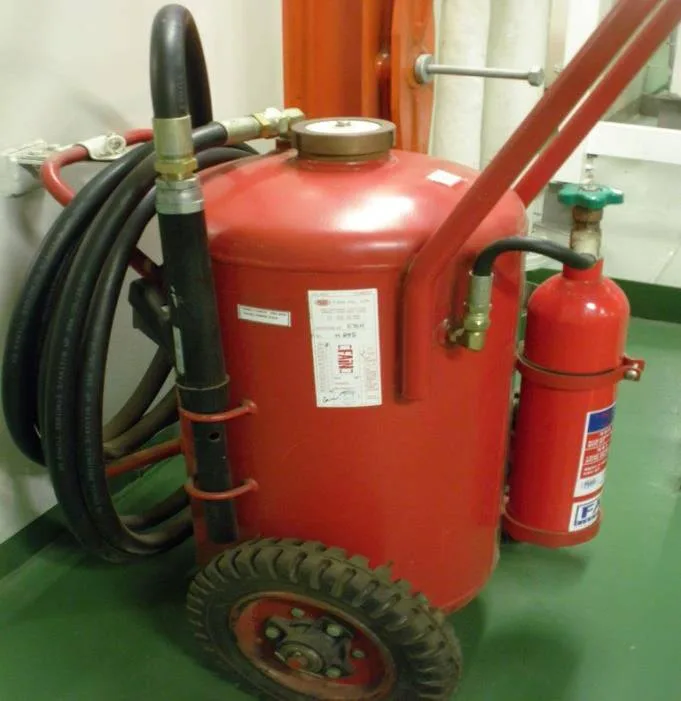 Wheeled semi-portable extinguisher with long hose